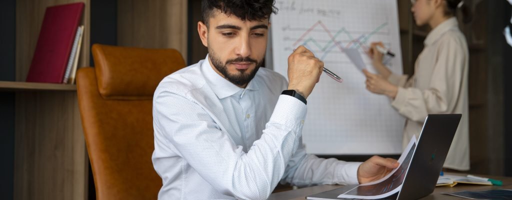 office-workers-using-finance-graphs